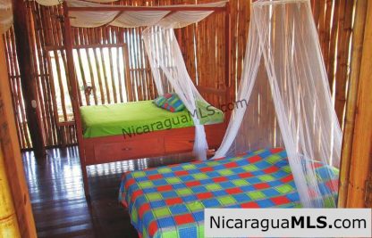 Timber & bamboo Palapa Palace at Playa Marsella