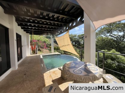 This Playa Maderas surf view home with infinity pool could be yours!  VERY negotiable purchase terms too!