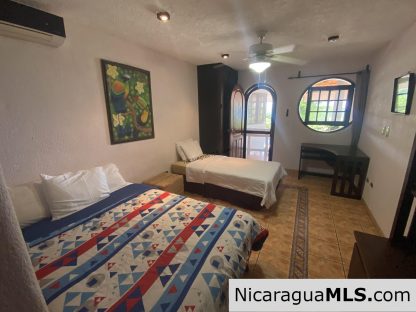 Landmark entertainer home in a quiet, gated development mere minutes from town
