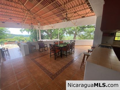 Landmark entertainer home in a quiet, gated development mere minutes from town