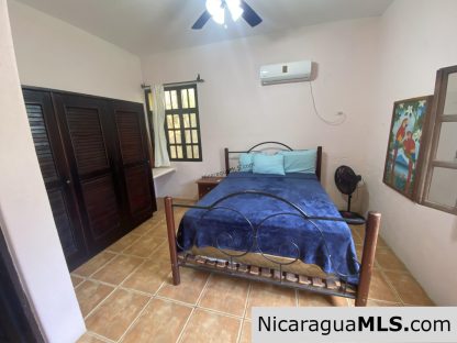 Landmark entertainer home in a quiet, gated development mere minutes from town