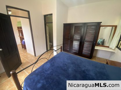 Landmark entertainer home in a quiet, gated development mere minutes from town