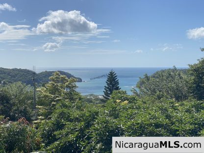 Landmark entertainer home in a quiet, gated development mere minutes from town