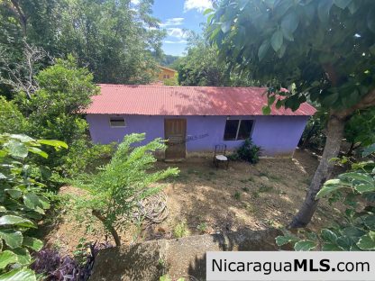Landmark entertainer home in a quiet, gated development mere minutes from town