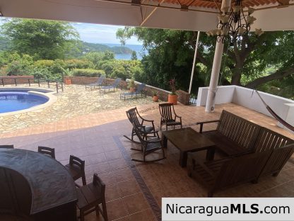 Landmark entertainer home in a quiet, gated development mere minutes from town