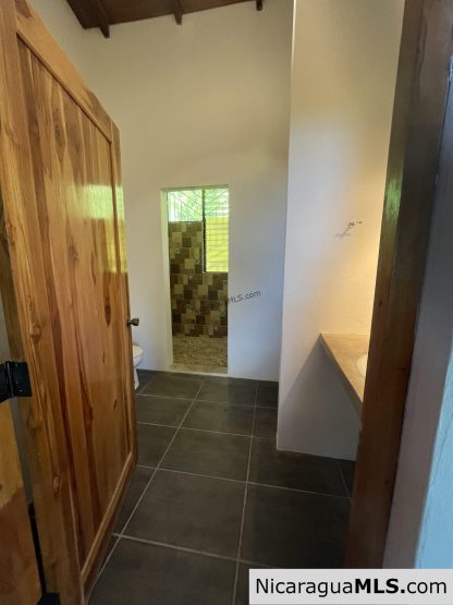 This Playa Maderas surf view home with infinity pool could be yours!  VERY negotiable purchase terms too!